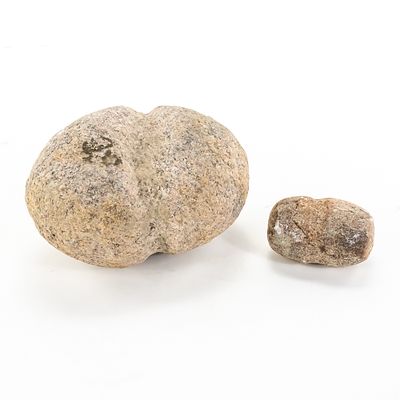 Two Native American Grooved Mauls (2). This pair of prehistoric-style stone tools, likely 