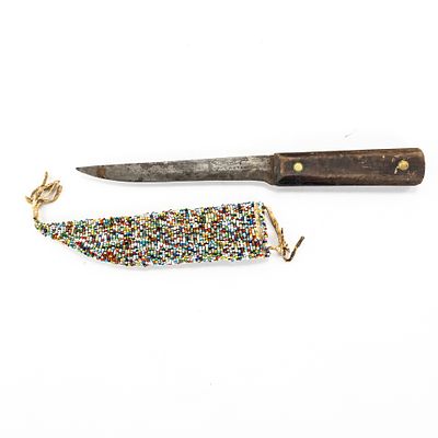 Ontario Knife Co. Knife and Beaded Sheath. This vintage fixed-blade utility knife, manufactured 
