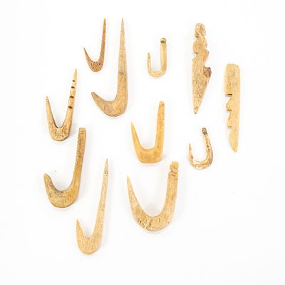 11pc Primitive Bone Fish Hook Collection. This collection features eleven hand-carved bone 