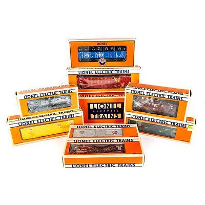 Lionel UP Dash-8 Diesel Locomotive & RR Car. Collection showcases Lionel Union Pacific Dash-8 