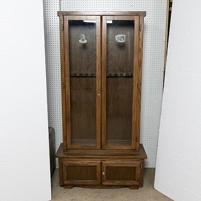 Wooden Upright Gun Display Cabinet. Note: Pickup/Transport required. Contacts available post 