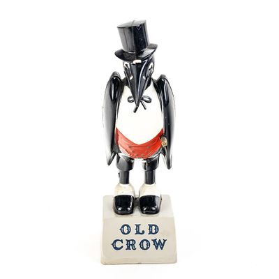 Vintage Old Crow Bourbon Advertising Figure, brand's iconic mascot wearing a top hat and tuxedo 