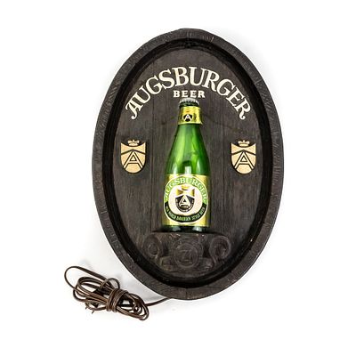 Vintage Augsburger Beer Advertising Sign, features a blow molded barrel-shaped plaque, a green 