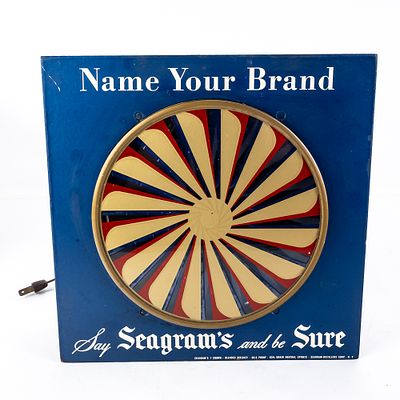 Vintage Seagram's Whiskey Lighted Motion Sign, features a circular inner spinner that rotates 