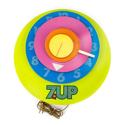 Vintage 7-Up Uncentric Advertising Clock, represents the height of the mid-20th Century pop art 