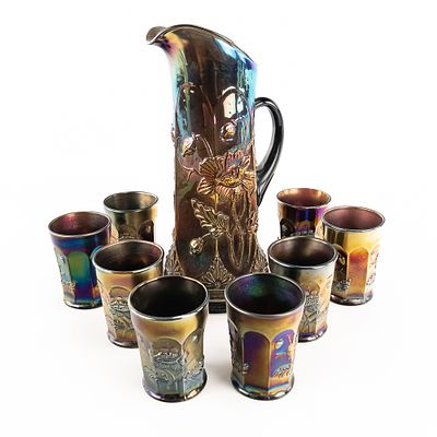 Carnival Glass N'wood Oriental Poppy 9pc Water Set. Pitcher and 8 matching tumblers in amethyst 