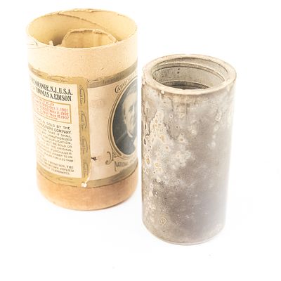 Brown Wax Cylinder Record. Brown wax cylinder record with handwritten note inside attributes 