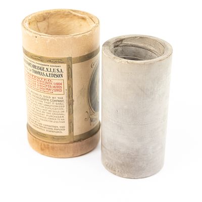 Brown Wax Cylinder Record. Brown wax cylinder exhibits significant surface bloom and organic 