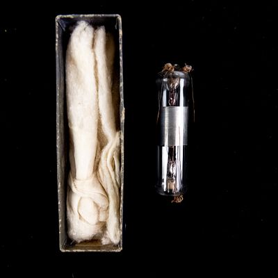 Early Double-Ended Vacuum Tube Apparatus. This early experimental glass vacuum tube is a rare 