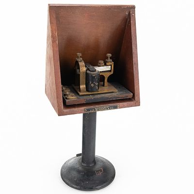 J.H. Bunnell Telegraph Sounder Resonator. An early 20th-century telegraph sounder and wooden 