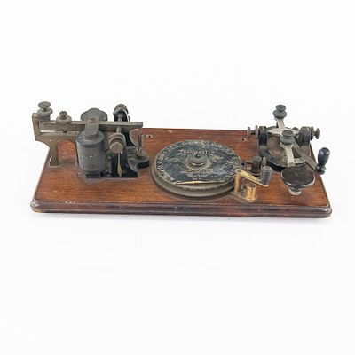 Omnigraph Morse Code Key. An early 20th-century Omnigraph Morse code training transmitter 