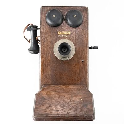 Western Electric Oak Wall Telephone. This classic turn-of-the-century hand-crank wall telephone 