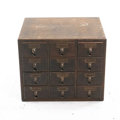 Vintage 12-Drawer Oak Card Catalog. This classic early 20th-century American office card catalog 
