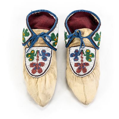 Beaded Native American Moccasins. This exceptional pair of Native American style moccasins 