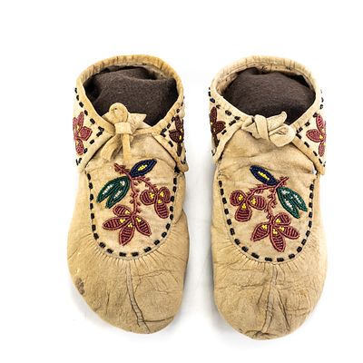 Pair of Beaded Moccasins-Floral. This exceptional pair of Native American soft-sole moccasins 