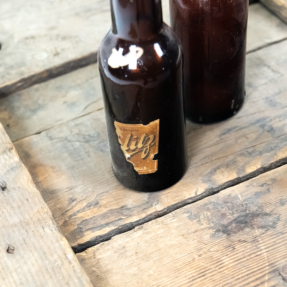 Antique Schiltz Beer Crate and bottles.