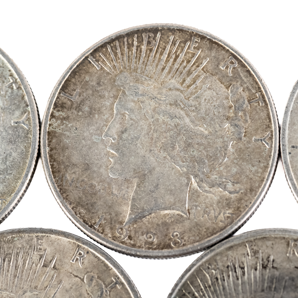 (5) 1922-1928 Peace Silver Dollars $1