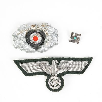 WWII German Insignia Mix. 1) Heer breast eagle cloth insignia. Bullion thread officer example. 