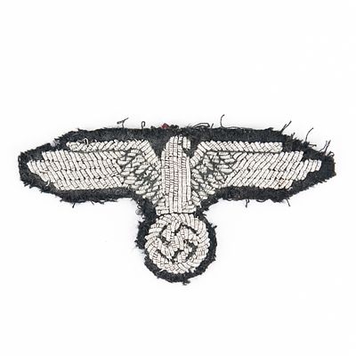 WWII German Waffen-SS Sleeve Eagle Patch (SS-Armelhoheitsabzeichen). Good condition. Worn on 