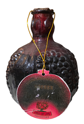 בקבוק שכר רימונים סגור ומלא. כשר.