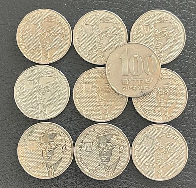 10 מטבעות 100 שקלים ז׳בוטינסקי עם הדמות.