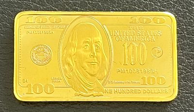 (קופי) מטיל זהב 100$ חדש בקפסולה.