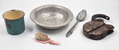 Personal belongings of victims found on the grounds of the Chelmno camp. We recently received 