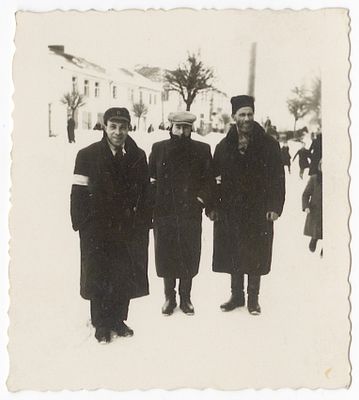 Eight photographs of Jews wearing armbands in the ghettos of Poland. Eight photographs of Jews 
