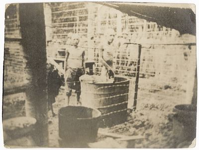 A horrifying photograph of Jews in the Dachau death camp - August 1944. An extremely rare 
