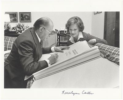 Menachem Begin presenting a dedicated gift to Rosalynn Carter - A photograph signed by Rosalynn 