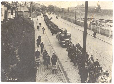 Rare Photograph of Dachau Camp Commanders and SS Men Escorted by Allied Soldiers Following the 