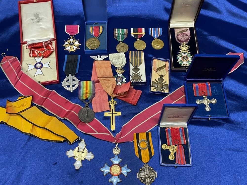 Lot 196: Rare OSS Spy Leader Medal and Document Group