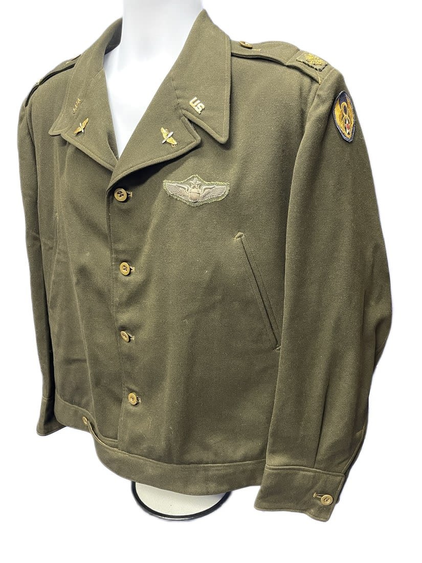Lot 207: WWII 8th Air Force ETO Jacket - Major and Senior Pilot.