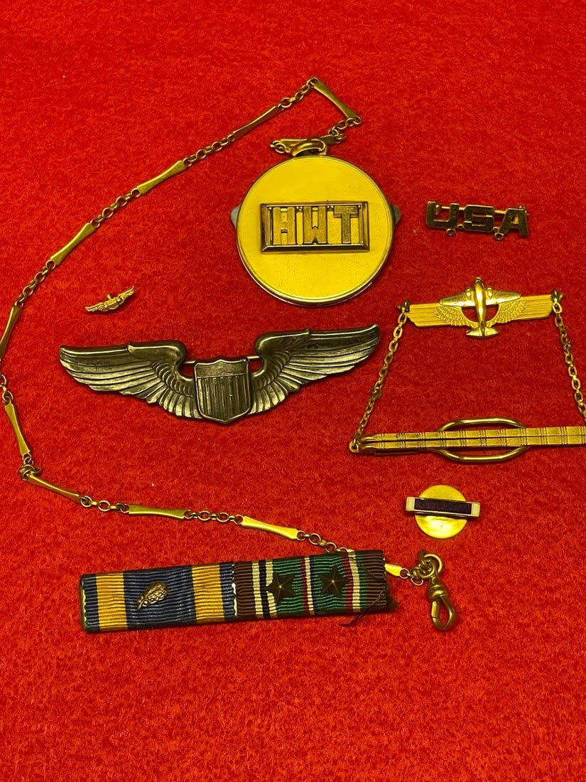 Lot 214: WWII Misc. Air Corps Insignia and Wings