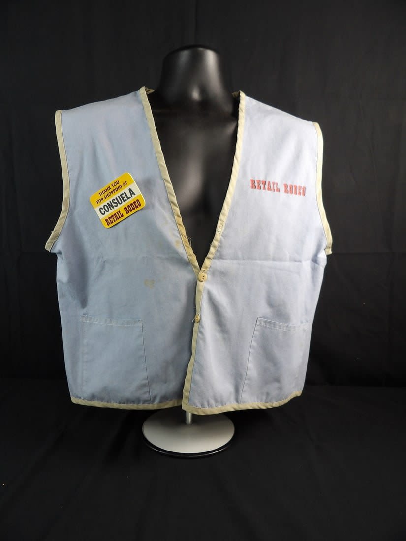 Lot 1: Hollywood Costume store employee vest from the 2002 Movie "the Good Girl"
