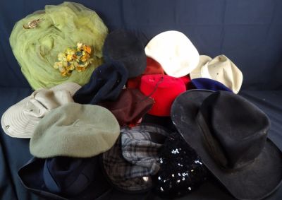 Large lot of Movie costume hats and visors. Roughly 26 hats in varying condition