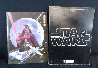 Lot of original 1977 Star Wars Books. Some wear on both books. Folio has some binding separation