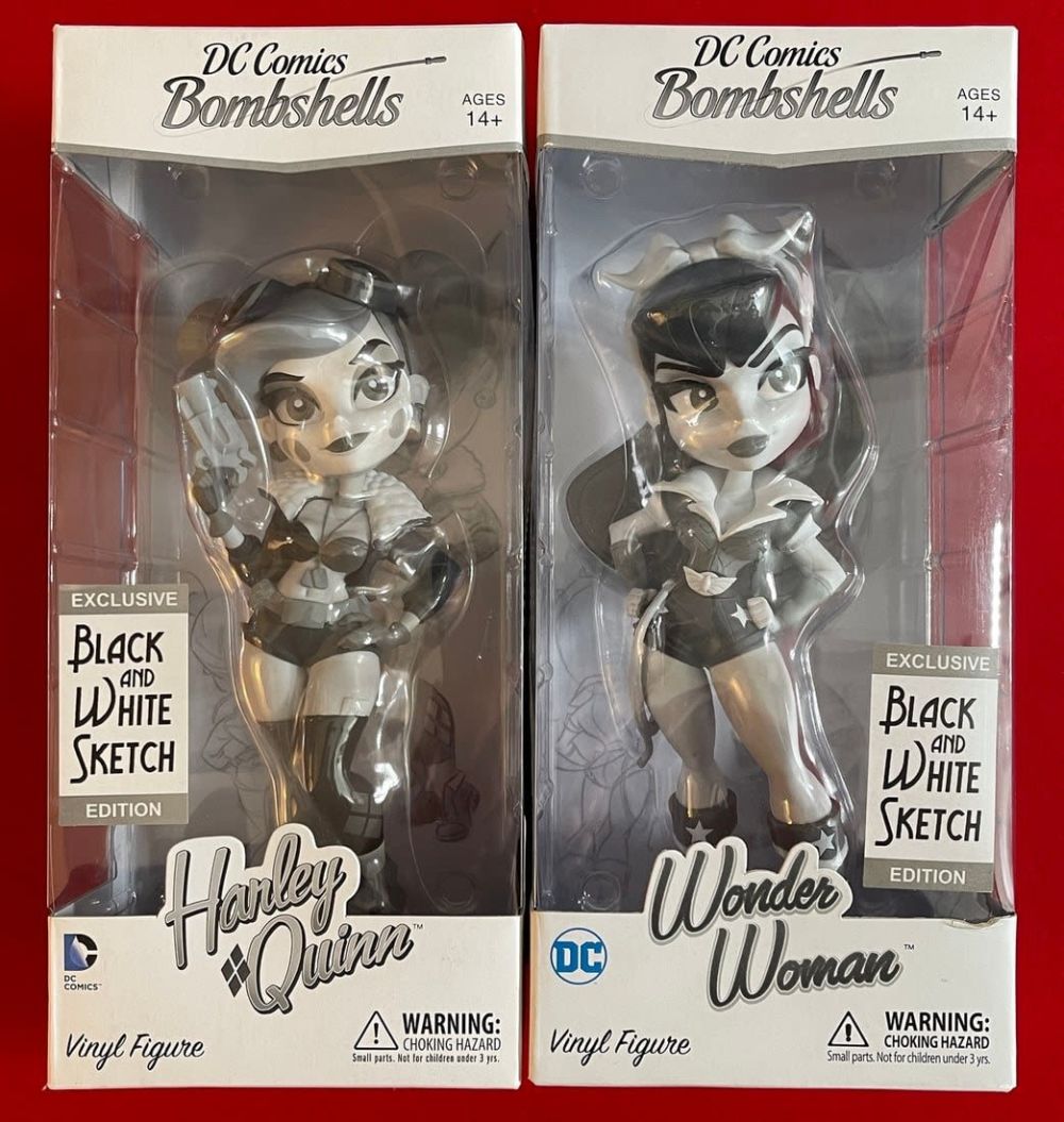 Lot 638: 2 DC Bombshells Vinyl Figures - Harley Quinn and Wonder Woman