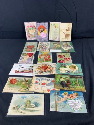 Early 1900s antique Valentines Day postcard lot. Wear and writing may be present. Lot of 19