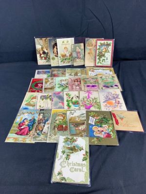 Large lot of early 1900s Christmas Themed Postcards. Same may have writing and wear. Lot of 29