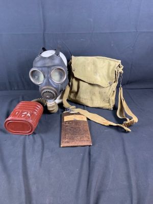 WW2 WWII British Army No 4 Gas mask and bag. Includes original eyeshields. Dated 1941. Stains 