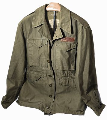 WWII RARE M43 with Chinese leather name tag.Named. Also chinese laundry tag on inside of 