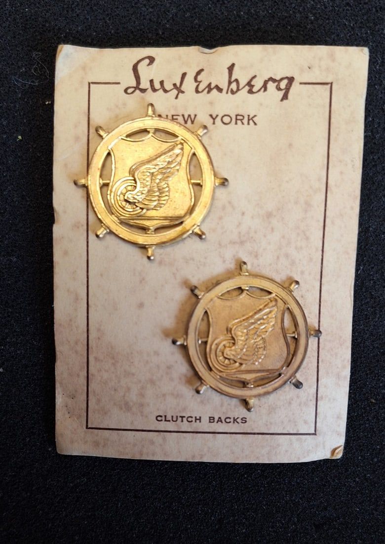 Lot 15: WWII Luxenberg made Transportation Corps Pair on Original Sales Card