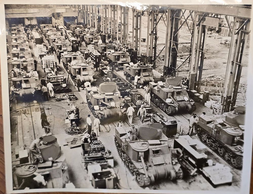 Lot 94: 3 large 9x7 AP photos of M3 Lees at plant, M3 Stuart running over a car and M3 Lees being worked ok