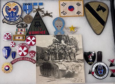 Collection of US Army 1st Cavalry Division, Military Police, and Korean War Era Insignia and 