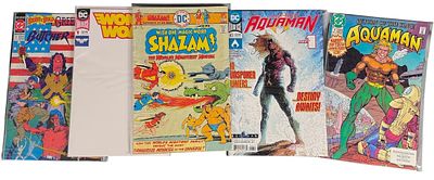 DC Comic Books including Shazam and Aquaman Titles. A collection of DC comic books featuring a 