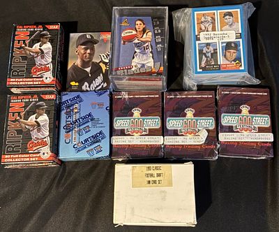 A Collection of Sports and Racing Trading Card Sets and Memorabilia. Sports and racing trading 