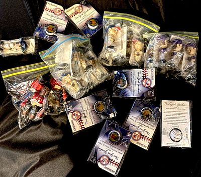 A Collection of 2006 New York Yankees Mini-Baseball Collection Items and Sports Figurines. A 
