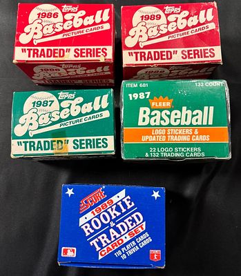 A Collection of Topps, Fleer, and Score Baseball Traded and Rookie Factory Sets. A collection of 
