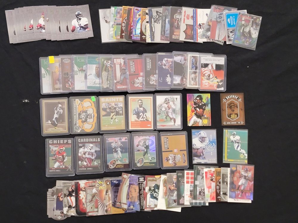 Lot 402: An Assortment of NFL Football Trading Cards Featuring Topps, Upper Deck, and Donruss Brands circa